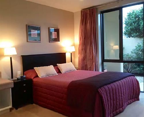 넬슨 팔라조 모터 로지 모텔 외부 사진 A bedroom
